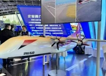 پهپاد غول‌پیکر ۶۰ تُنی چین وارد میدان شد/ جابجایی بالگرد و کانتینرهای نظامی با پهپاد

